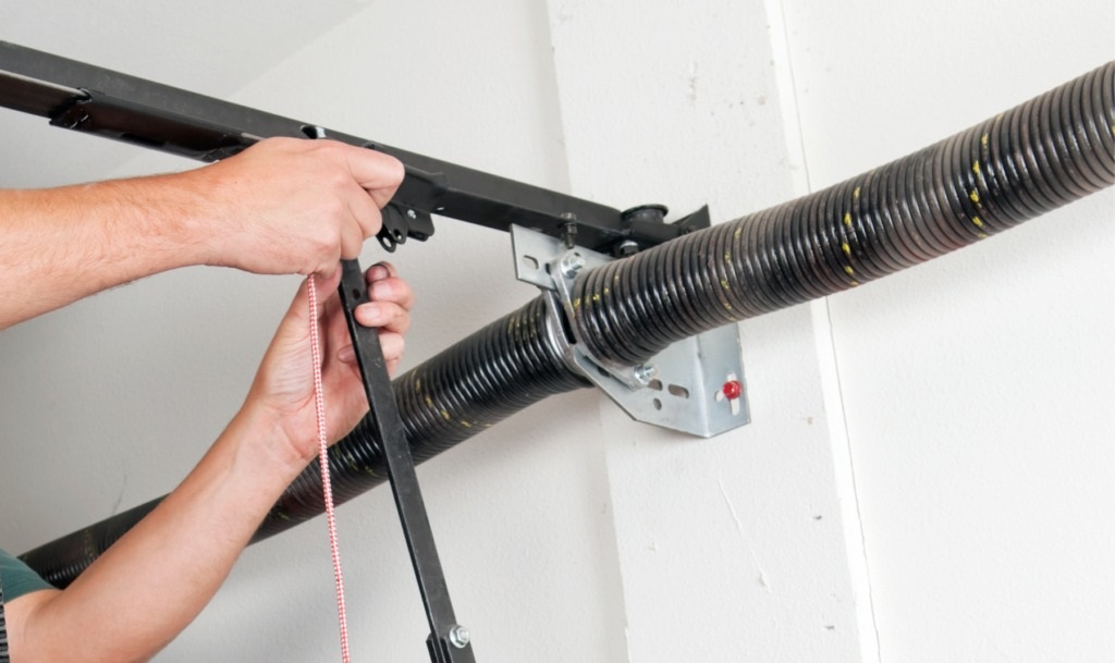 What tools do I need to replace a garage door spring