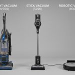 A golden retriever sitting on a wooden floor next to a pet hair vacuum.